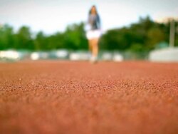 woman running on the track Stock Footage