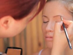 make-up of young woman Stock Footage