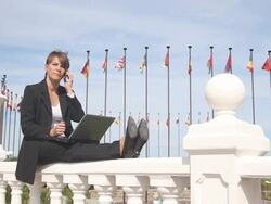 business woman with laptop and mobile phone Stock Footage