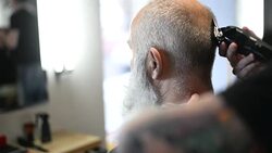 brutal barber clipper mows bearded adult senior hipster Stock Footage