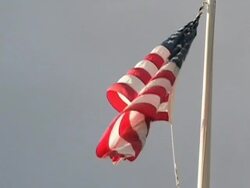 American flag flying at Pearl Harbor Stock Footage