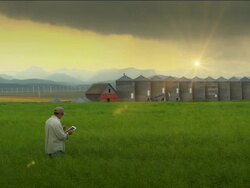 HD DOLLY: Farmer in Grain Field Using Tablet Stock Footage