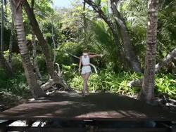 MS Ballerina dancer dancing in point shoes on wooden stage surrounded by palm trees / Montezuma, Nicoya Peninsula, Costa Rica Stock Footage