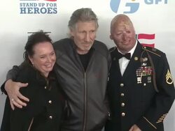 Roger Waters (center), Staff Sgt. Robert Henline U.S. Army, NYCF, Veterans Airlift Command and guests at The 6th Annual Stand Up For Heroes Presented by The New York Comedy Festival and The Bob Woodruff Foundation Stock Footage
