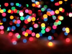 Blinking Christmas Lights at Night - Loopable (HD,NTSC) Stock Footage