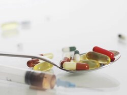 HD DOLLY: Spoon Of Pills And A Syringe Stock Footage