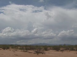 T/L Sonoran Desert, clouds building, Arizona, USA Stock Footage