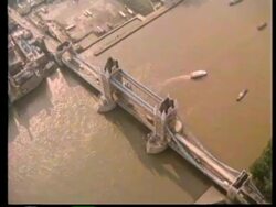 ARCHIVAL - Aerial Tower Bridge and Westminster Bridge.  1983 Stock Footage