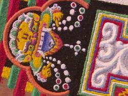 CU  Buddhist image of  face being created with color sand on  mandala  AUDIO / Kathmandu, Central Region, Nepal  Stock Footage