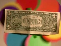 Dollar turnaround: pinwheel running in the background Stock Footage