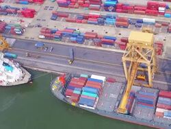 Aerial View of Industrial port with containers ship Stock Footage