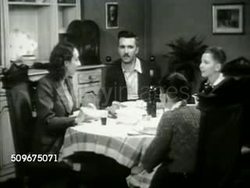 1942: U.S. PRESIDENT FDR OVER NORTH AFRICA RADIO: (VO President Franklin Roosevelt speaking in French) VS Arabs listening to radio, French family at diner table listening. MS Radio, Philippe Petain picture on wall BG. MS Boys listening at table. WWII Instructional Video