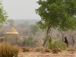 WS, Woman using mortar and pestle in village, Niamey, Niger Stock Footage