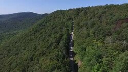 4K aerial rising above the Green Mountains in Vermont, USA Stock Footage