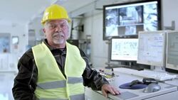 DS portrait of worker in recycling facility control center Stock Footage