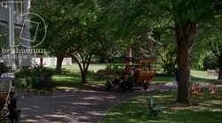 Trolley driving up to manor house, 1908 - reenactment, clip 2 Stock Footage