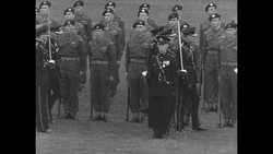 Prince Henry, Duke of Gloucester, presents new colors to the Gloucestershire Regiment News Clip