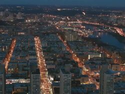 Aerial pan over Harlem at night with view of the Bronx, NYC Stock Footage
