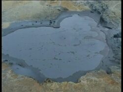 Iceland, MS bubbling mud pools (blue colour) Stock Footage