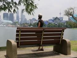 HD Video of woman looking at Kuala Lumpur, Malaysia Stock Footage