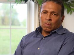 Man Expresses Concern and Sorrow Looking at Camera b Stock Footage