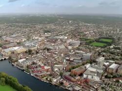 Aerial wide shot pan over Thames and Kingston-Upon-Thames / Surrey,  England Stock Footage