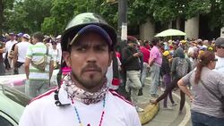 VOICED : Oposicion venezolana vuelve a marchar entre gases lacrimogenos News Clip