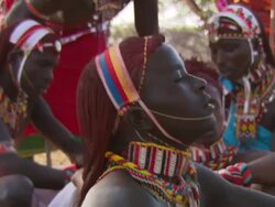 Maasai Ceremony - Group of young warriors dressing their hair, WITH AUDIO Stock Footage