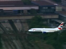 Aerial British Airways plane landing at Gatwick Airport/ West Sussex, England Stock Footage