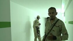 VOICED: Rebels uncover Kadhafi son's 'James Bond' bunker News Clip