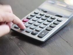Businessman using a calculator Stock Footage