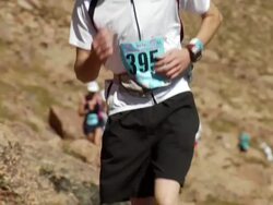 MS CU Runner comes towards on camera and out of focus during on race / Colorado Springs/ Pikes Peak,CO,USA Stock Footage