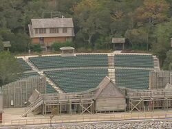 MS AERIAL Shot of Empty auditorium and fort raleigh and roanoke Gardens with lake / North Carolina, United States Stock Footage