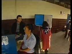 Polling stations open, top Colom campaign official shot News Clip