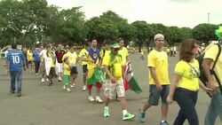 CLEAN : Muted Brazilian fans arrive for third place play off News Clip