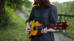 Girl with ukulele Stock Footage