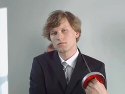 HD Super Slow-Mo: Portrait Of Businessman With Fencing Foil Stock Footage