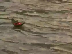 Prayer leaf boats floating in water, Ganges River, Haridwar, Uttarakhand, India Stock Footage