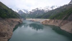 Depleted reservoir in mountain environment Stock Footage