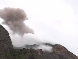Ash rises from crater of Stromboli volcano, Stromboli, Italy. March 2010 Stock Footage