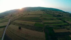 Aerial panorama over green fields farms summer Stock Footage