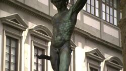 A sculpture of Perseus and Medusa stands near a hotel in Florence, Italy. Stock Footage