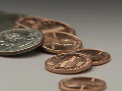 CU, FOCUSING, PAN, American coins on white background Stock Footage