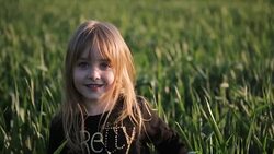 Girl enjoying the wheat field Stock Footage