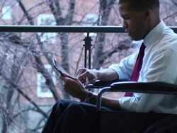 Disabled Businessman with Tablet Computer - MCU Stock Footage
