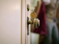 Young couple in hotel room Stock Footage