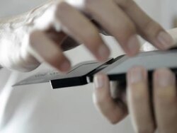 CNGLRET1047 People making mobile payment Stock Footage