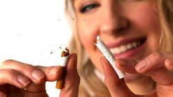 Pretty blonde snapping a cigarette Stock Footage