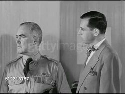 1951: EMERGENCY PREPAREDNESS: DRAMATIZATION: 'City official' explaining to 'Colonel' that many stations have generators, some have stand-bys, Hams have their own hook up. Civil Defense Plan, The Red Scare, McCarthyism. Instructional Video
