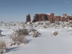 MS View of Fresh Snow on Red Rock Desert, Natural Arch / Moab, Utah, United States Stock Footage